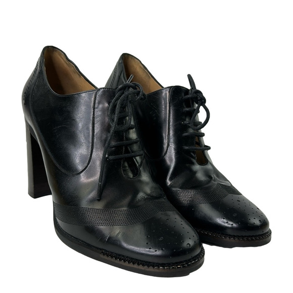 Salvatore Ferragamo black leather heeled lace up ankle bootie - Picture 1 of 11